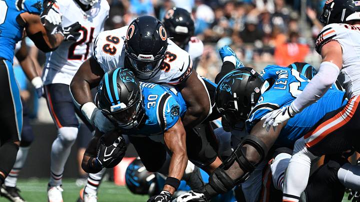 Carolina Panthers running back Chuba Hubbard (30) dives for a touchdown Carolina Panthers running back Chuba Hubbard (30) dives for a touchdown