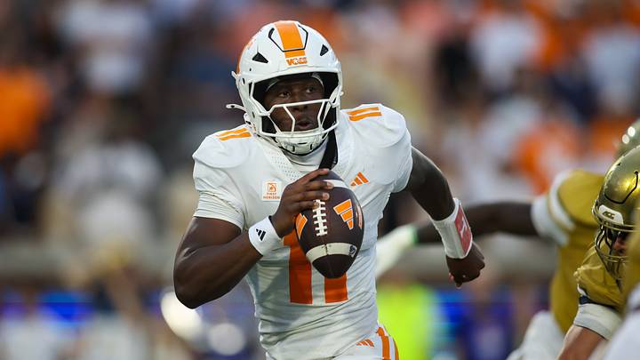 Sep 12, 2026; Atlanta, Georgia, USA; Tennessee Volunteers quarterback Faizon Brandon (11) avoids a defender against the Georgia Tech Yellow Jackets in the first quarter at Bobby Dodd Stadium at Hyundai Field. Mandatory Credit: Brett Davis-Imagn Images Sep 12, 2026; Atlanta, Georgia, USA; Tennessee Volunteers quarterback Faizon Brandon (11) avoids a defender against the Georgia Tech Yellow Jackets in the first quarter at Bobby Dodd Stadium at Hyundai Field. Mandatory Credit: Brett Davis-Imagn Images