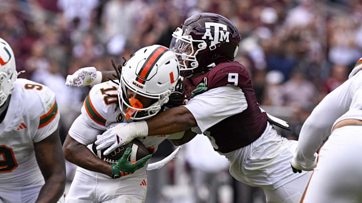 Dec 20, 2025; College Station, TX, USA; Texas A&M Aggies defensive end Cashius Howell (9) tackles Miami Hurricanes wide receiver Malachi Toney (10) during the game between the Aggies and the Hurricanes Dec 20, 2025; College Station, TX, USA; Texas A&M Aggies defensive end Cashius Howell (9) tackles Miami Hurricanes wide receiver Malachi Toney (10) during the game between the Aggies and the Hurricanes