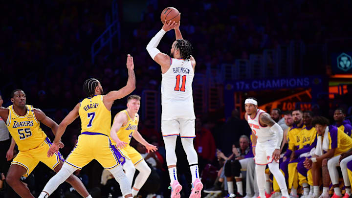Mar 6, 2025; Los Angeles, California, USA; New York Knicks guard Jalen Brunson (11) shoots against Los Angeles Lakers guard Gabe Vincent (7) during the second half at Crypto.com Arena. Mandatory Credit: Gary A. Vasquez-Imagn Images