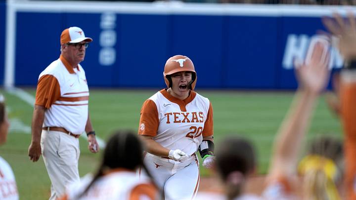 Texas Longhorns utility Katie Stewart (20) celebrates after hitting a home run in the first inning during Game 1 of the NCAA softball Women's College World Series finals between the Texas Longhorns and the Texas Tech Red Raiders at Devon Park in Oklahoma City, Wednesday, June 3, 2026.