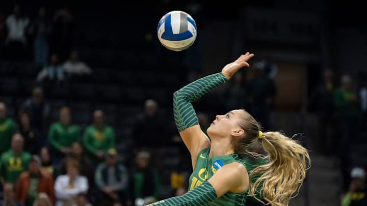 Oregon outside hitter Mimi Colyer serves as the Oregon Ducks host High Point in the first round of the NCAA volleyball tournament Thursday, Dec. 5, 2024 at Matthew Knight Arena in Eugene, Ore.