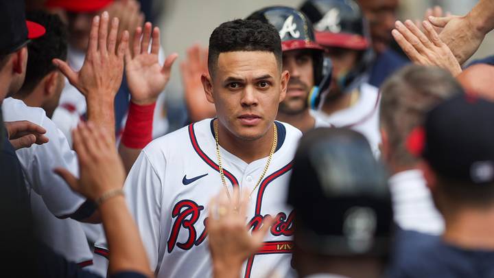 Sep 30, 2024; Atlanta, Georgia, USA; Atlanta Braves third baseman Gio Urshela (9) celebrates with teammates after scoring a run against the New York Mets in the eighth inning at Truist Park. Mandatory Credit: Brett Davis-Imagn Images
