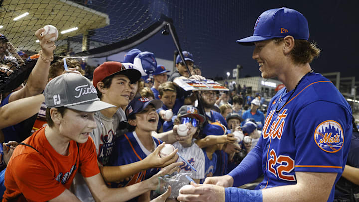 Mar 11, 2023; West Palm Beach, Florida, USA; New York Mets third baseman Brett Baty (22) signs