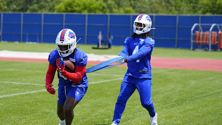 Jun 11, 2025; Orchard Park, NY, USA; Buffalo Bills running back Frank Gore Jr. (20) works out with running back James Cook (4) during Minicamp at Highmark Stadium