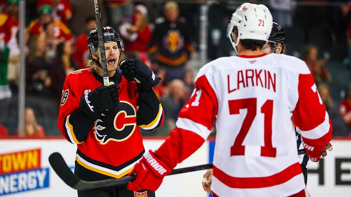 Oct 24, 2026; Calgary, Alberta, CAN; Calgary Flames left wing Brennan Othmann (78) and Detroit Red Wings center Dylan Larkin (71) exchanges words during the third period at Scotiabank Saddledome. Mandatory Credit: Sergei Belski-Imagn Images Oct 24, 2026; Calgary, Alberta, CAN; Calgary Flames left wing Brennan Othmann (78) and Detroit Red Wings center Dylan Larkin (71) exchanges words during the third period at Scotiabank Saddledome. Mandatory Credit: Sergei Belski-Imagn Images