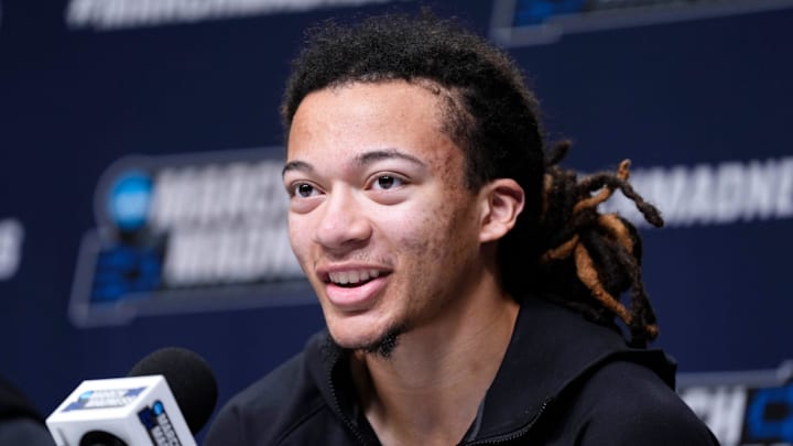 Houston's Kingston Flemings speaks during a press conference for the first round of the NCAA basketball tournament at Paycom Center in Oklahoma City, Wednesday, March 18, 2026.