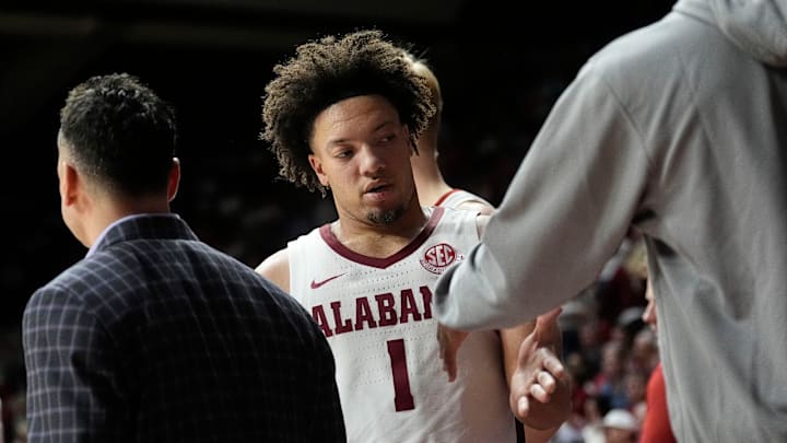 Feb 1, 2025; Tuscaloosa, AL, USA; Alabama guard Mark Sears (1) is congratulated as he leaves the floor near the end of the game at Coleman Coliseum. Alabama downed Georgia 90-69. Mandatory Credit: Gary Cosby Jr.-Tuscaloosa News Feb 1, 2025; Tuscaloosa, AL, USA; Alabama guard Mark Sears (1) is congratulated as he leaves the floor near the end of the game at Coleman Coliseum. Alabama downed Georgia 90-69. Mandatory Credit: Gary Cosby Jr.-Tuscaloosa News