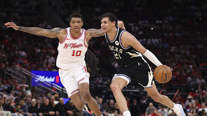 Apr 1, 2026; Houston, Texas, USA; Milwaukee Bucks forward Ousmane Dieng (21) dribbles the ball as Houston Rockets forward Jabari Smith Jr. (10) defends during the fourth quarter at Toyota Center. Mandatory Credit: Troy Taormina-Imagn Images Apr 1, 2026; Houston, Texas, USA; Milwaukee Bucks forward Ousmane Dieng (21) dribbles the ball as Houston Rockets forward Jabari Smith Jr. (10) defends during the fourth quarter at Toyota Center. Mandatory Credit: Troy Taormina-Imagn Images