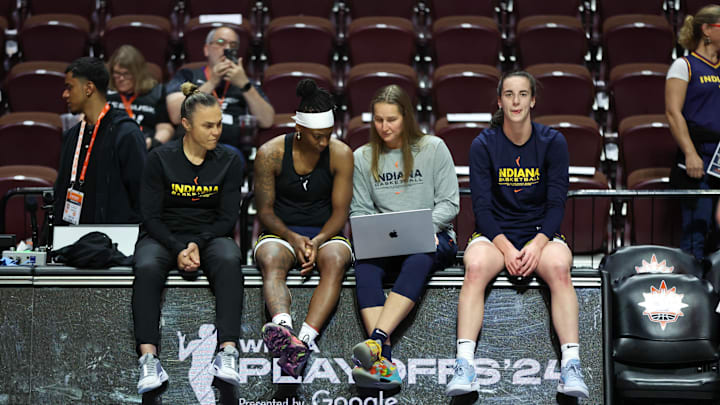 Sep 25, 2024; Uncasville, Connecticut, USA; Indiana Fever guard Caitlin Clark (22) looks on before playing against the Connecticut Sun during game two of the first round of the 2024 WNBA Playoffs at Mohegan Sun Arena. Mandatory Credit: Paul Rutherford-Imagn Images