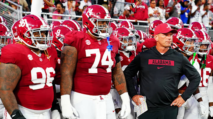 Sep 28, 2024; Tuscaloosa, Alabama, USA; Alabama Crimson Tide head coach Kalen DeBoer leads his team onto the field before the game against the Georgia Bulldogs at Bryant-Denny Stadium. Mandatory Credit: John David Mercer-Imagn Images