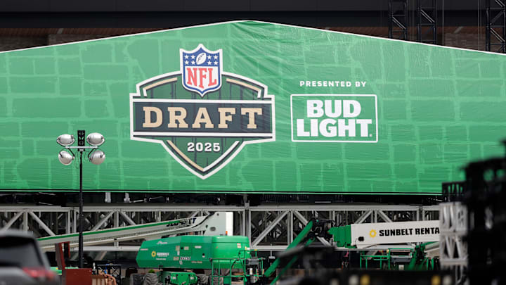 Crews work to raise the roof of the NFL draft theater on April 9, 2025, in the parking lot of Lambeau Field in Green Bay, Wis. Crews work to raise the roof of the NFL draft theater on April 9, 2025, in the parking lot of Lambeau Field in Green Bay, Wis.