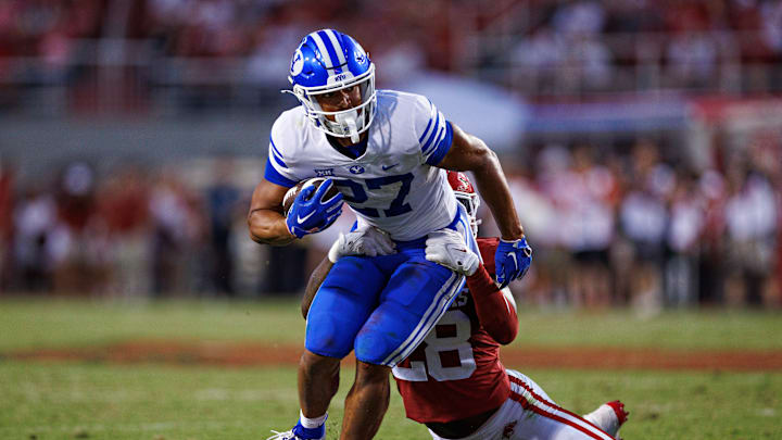 BYU's LJ Martin sheds a tackle against the Arkansas Razorbacks