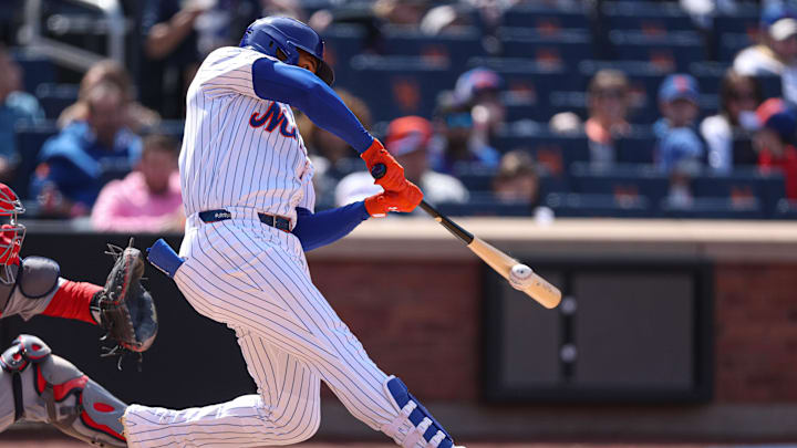 Apr 20, 2025; New York City, New York, USA; New York Mets right fielder Juan Soto (22) singles during the fifth inning against the St. Louis Cardinals at Citi Field. Mandatory Credit: Vincent Carchietta-Imagn Images