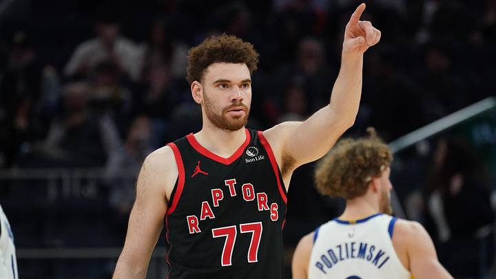 Jan 20, 2026; San Francisco, California, USA; Toronto Raptors forward Jamison Battle (77) motions to a teammate during a game against the Golden State Warriors in the third quarter at Chase Center. Mandatory Credit: David Gonzales-Imagn Images