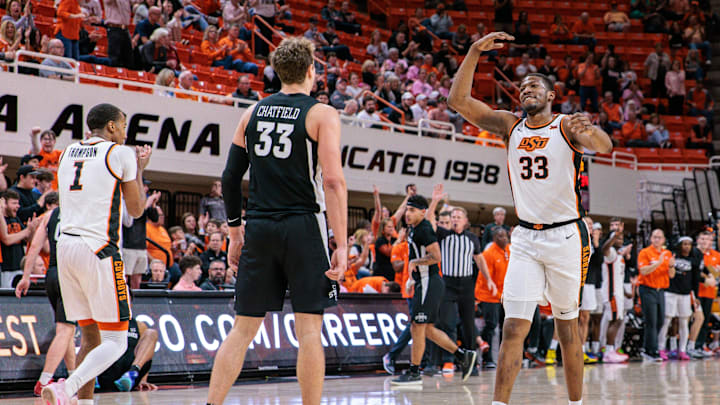 Feb 25, 2025; Stillwater, Oklahoma, USA; Oklahoma State Cowboys forward Abou Ousmane (33) reacts after a play during the second half against the Iowa State Cyclones at Gallagher-Iba Arena. Mandatory Credit: William Purnell-Imagn Images