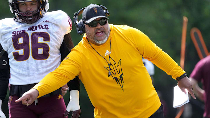 ASU offensive line coach Saga Tuitele runs a drill as the team holds their first day of practice at Camp Tontozona on Aug. 6, 2025.