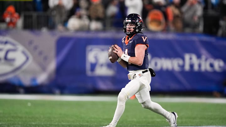 Dec 6, 2025; Charlotte, NC, USA; Virginia Cavaliers quarterback Chandler Morris (4) looks to pass in the second half against the Duke Blue Devils during the 2025 ACC Championship game at Bank of America Stadium. Mandatory Credit: Jim Dedmon-Imagn Images