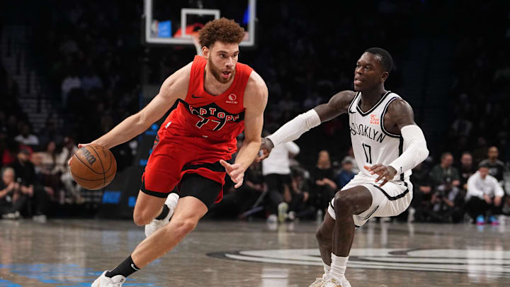 Oct 18, 2024; Brooklyn, New York, USA; Toronto Raptors forward Jamison Battle (77) dribbles the ball against Brooklyn Nets point guard Dennis Schroder (17) during the second half at Barclays Center. Mandatory Credit: Gregory Fisher-Imagn Images Oct 18, 2024; Brooklyn, New York, USA; Toronto Raptors forward Jamison Battle (77) dribbles the ball against Brooklyn Nets point guard Dennis Schroder (17) during the second half at Barclays Center. Mandatory Credit: Gregory Fisher-Imagn Images