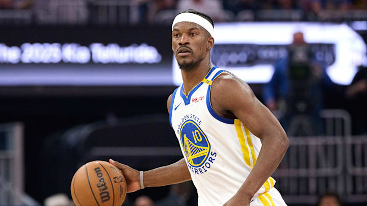 Apr 13, 2025; San Francisco, California, USA; Golden State Warriors forward Jimmy Butler III (10) controls the ball against the LA Clippers during the first quarter at Chase Center. Mandatory Credit: Robert Edwards-Imagn Images