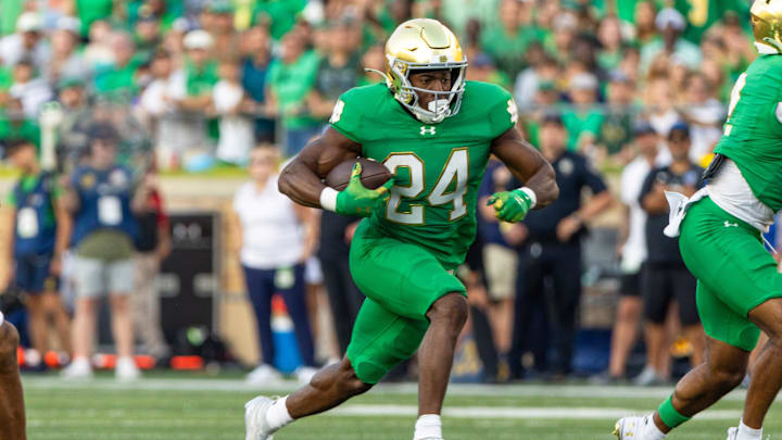 Oct 4, 2025; South Bend, Indiana, USA; Notre Dame Fighting Irish running back Jadarian Price (24) runs for a touchdown against the Boise State Broncos during the second half at Notre Dame Stadium. Mandatory Credit: Michael Caterina-Imagn Images