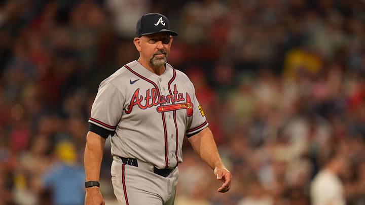 May 26, 2026; Boston, Massachusetts, USA; Atlanta Braves manager Walt Weiss (22) walks back to the dugout as they take on the Boston Red Sox in the sixth inning at Fenway Park. Mandatory Credit: David Butler II-Imagn Images