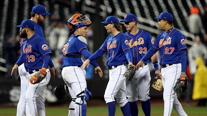 Oct 4, 2022; New York City, New York, USA; New York Mets catcher Francisco Alvarez (50) celebrates with second baseman Luis Guillorme (13) and relief pitcher Tylor Megill (38) and second baseman Jeff McNeil (1) and first baseman James McCann (33) and third baseman Mark Vientos (27) after defeating the Washington Nationals at Citi Field. Mandatory Credit: Brad Penner-Imagn Images