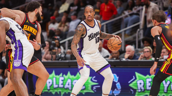 Nov 1, 2024; Atlanta, Georgia, USA; Sacramento Kings forward DeMar DeRozan (10) dribbles against the Atlanta Hawks in the second quarter at State Farm Arena. Mandatory Credit: Brett Davis-Imagn Images