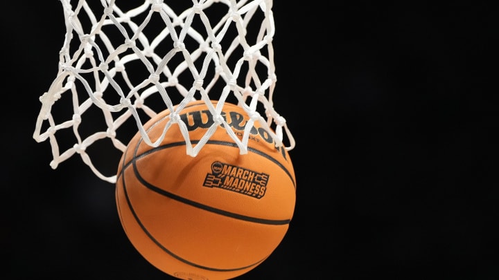 Mar 23, 2024; Charlotte, NC, USA; A ball goes through the net at Spectrum Center. Mandatory Credit: Bob Donnan-USA TODAY Sports Mar 23, 2024; Charlotte, NC, USA; A ball goes through the net at Spectrum Center. Mandatory Credit: Bob Donnan-USA TODAY Sports