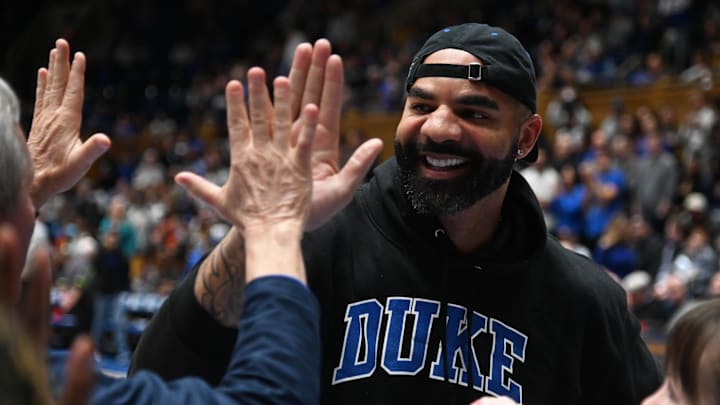 Dec 10, 2022; Durham, North Carolina, USA; Former Duke Blue Devils player Carlos Boozer greets fans during half-time after being inducted into the 2022 class of the Duke Hall of Fame at Cameron Indoor Stadium. 