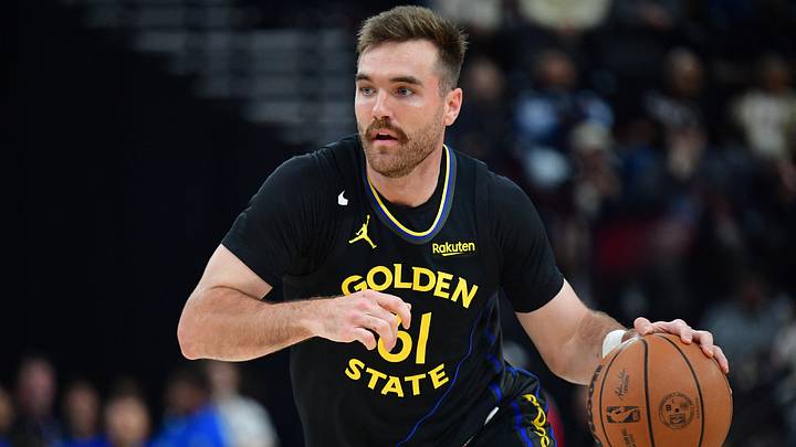 Golden State Warriors guard Pat Spencer (61) controls the ball against the Los Angeles Clippers during the first half at Intuit Dome.