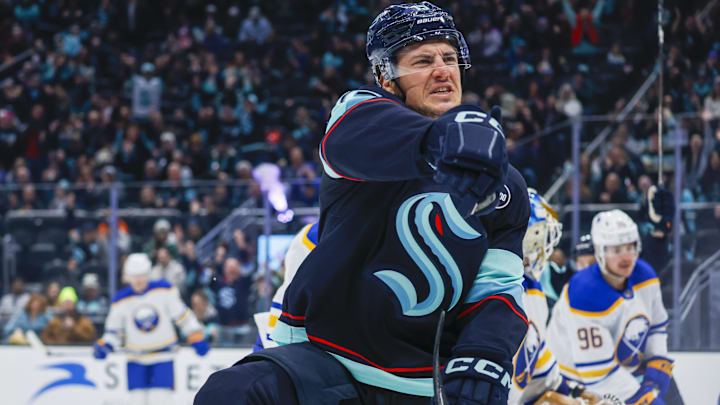 Jan 20, 2025; Seattle, Washington, USA; Seattle Kraken center John Hayden (15) celebrates after scoring a goal against the Buffalo Sabres during the first period at Climate Pledge Arena. Mandatory Credit: Joe Nicholson-Imagn Images