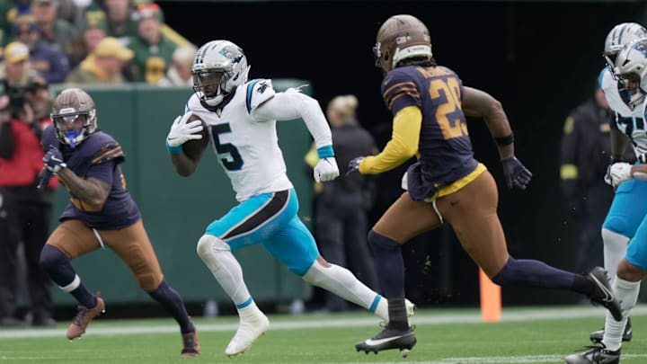 Carolina Panthers running back Rico Dowdle (5) sprints and picks up 29 yards during the second quarter of their game against the Green Bay Packers Sunday, November 2, 2025 at Lambeau Field in Green Bay, Wisconsin.
