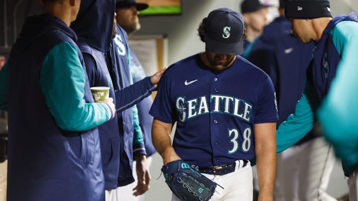 Seattle Mariners starting pitcher Robbie Ray (38) walks in the dugout after being relieved for against the Cleveland Guardians during the fourth inning at T-Mobile Park in 2023. Seattle Mariners starting pitcher Robbie Ray (38) walks in the dugout after being relieved for against the Cleveland Guardians during the fourth inning at T-Mobile Park in 2023.