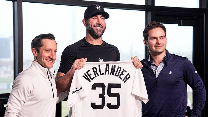 Detroit Tigers pitcher Justin Verlander poses for a photo with general manager Jeff Greenberg, left, and president of baseball operations Scott Harris during his introductory press conference at the 34 Club of Joker Marchant Stadium on Thursday, Feb. 12, 2026.