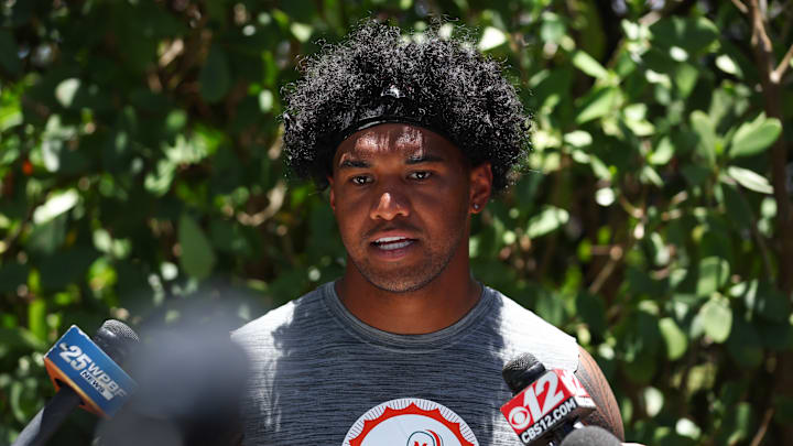 Tua Tagovailoa discusses his contract status with the media at the first day of mandatory minicamp at the Baptist Health Training Complex in Miami Gardens.