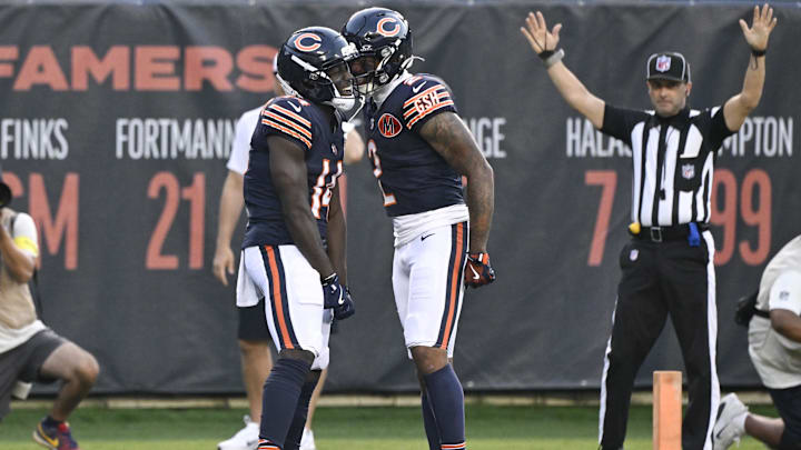Aug 17, 2025; Chicago, Illinois, USA;  Chicago Bears wide receiver Olamide Zaccheaus (14) celebrates with wide receiver DJ Moore (2) after scoring a touchdown against the Buffalo Bills during the first half at Soldier Field. Mandatory Credit: Matt Marton-Imagn Images