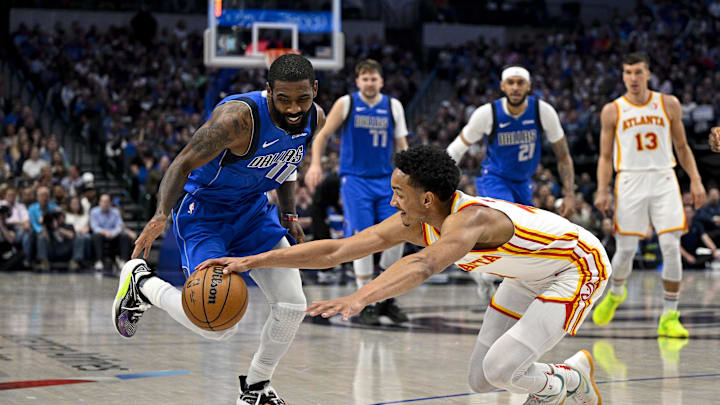 Apr 4, 2024; Dallas, Texas, USA; Dallas Mavericks guard Kyrie Irving (11) and Atlanta Hawks guard Apr 4, 2024; Dallas, Texas, USA; Dallas Mavericks guard Kyrie Irving (11) and Atlanta Hawks guard