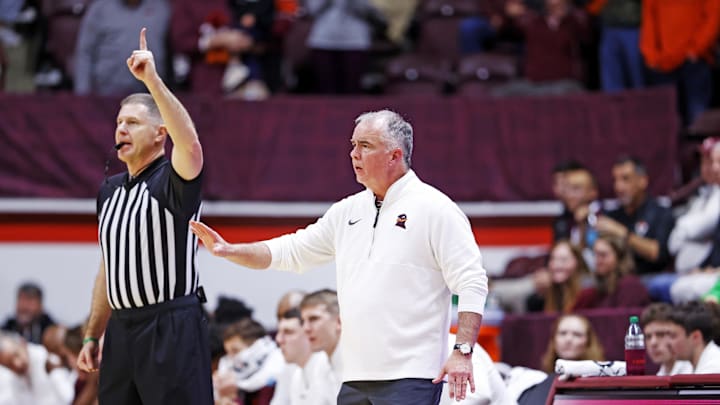 Jan 25, 2025; Blacksburg, Virginia, USA; Virginia Tech Hokies head coach Mike Young reacts during the game against Clemson Tigers during the first half at Cassell Coliseum. Mandatory Credit: Peter Casey-Imagn Images