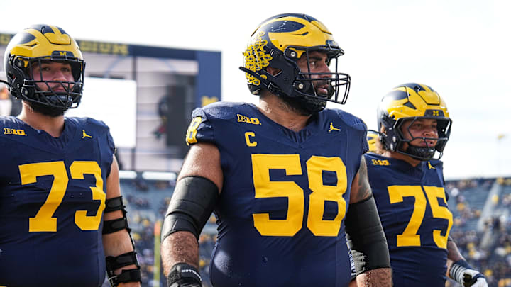 Michigan offensive lineman Giovanni El-Hadi (58) warms up ahead of the Washington game at Michigan Stadium in Ann Arbor on Saturday, Oct. 18, 2025. Michigan offensive lineman Giovanni El-Hadi (58) warms up ahead of the Washington game at Michigan Stadium in Ann Arbor on Saturday, Oct. 18, 2025.
