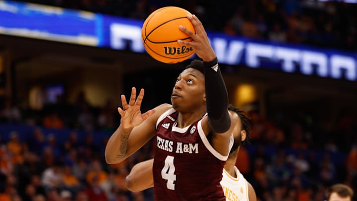 Mar 13, 2022; Tampa, FL, USA; Texas A&M Aggies guard Wade Taylor IV (4) drives to the basket
