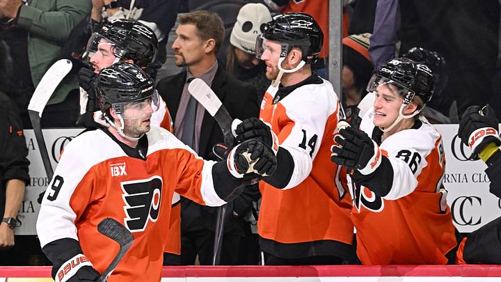 Oct 27, 2026; Philadelphia, Pennsylvania, USA; Philadelphia Flyers defenseman Jamie Drysdale (9) celebrates his goal with center Sean Couturier (14) and center Denver Barkey (86) against the Columbus Blue Jackets during the third period at Xfinity Mobile Arena. Mandatory Credit: Eric Hartline-Imagn Images