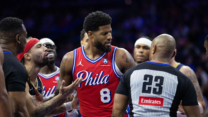 Jan 10, 2025; Philadelphia, Pennsylvania, USA; Philadelphia 76ers forward Paul George (8) has words with referee Tre Maddox (23) after a stoppage of play during the third quarter against the New Orleans Pelicans at Wells Fargo Center. Mandatory Credit: Bill Streicher-Imagn Images Jan 10, 2025; Philadelphia, Pennsylvania, USA; Philadelphia 76ers forward Paul George (8) has words with referee Tre Maddox (23) after a stoppage of play during the third quarter against the New Orleans Pelicans at Wells Fargo Center. Mandatory Credit: Bill Streicher-Imagn Images