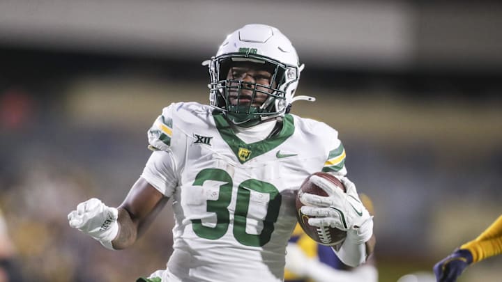 Baylor Bears running back Bryson Washington led the team with over 1,000 yards and 12 touchdowns rushing last season. Baylor Bears running back Bryson Washington led the team with over 1,000 yards and 12 touchdowns rushing last season.