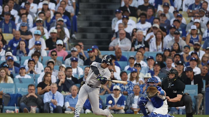 New York Yankees outfielder Juan Soto (22) gets a hit in the third inning against the Los Angeles Dodgers during game one of the 2024 MLB World Series at Dodger Stadium on Oct 25.