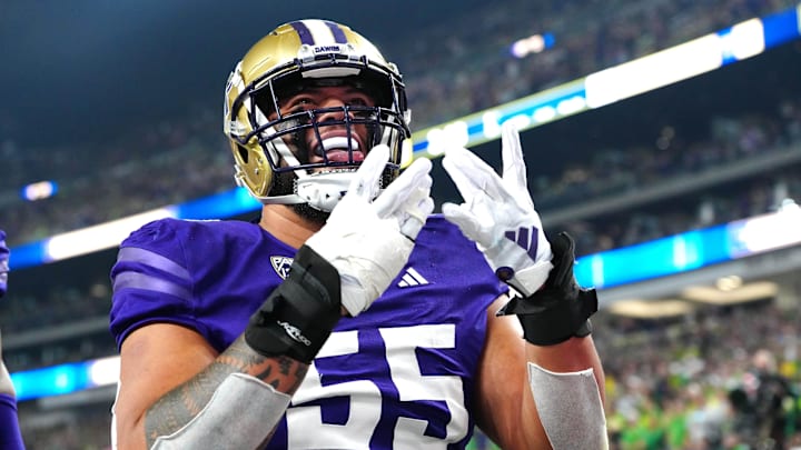 Dec 1, 2023; Las Vegas, NV, USA; Washington Huskies offensive lineman Troy Fautanu (55) celebrates