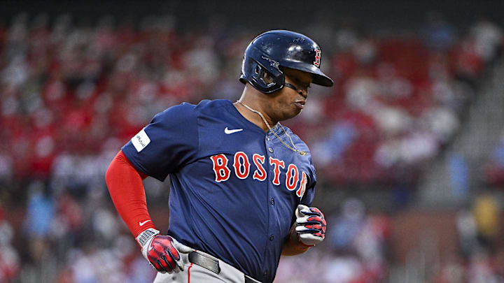 May 17, 2024; St. Louis, Missouri, USA;  Boston Red Sox third baseman Rafael Devers (11) runs the base after hitting a solo home run against the St. Louis Cardinals during the third inning at Busch Stadium. Mandatory Credit: Jeff Curry-Imagn Images