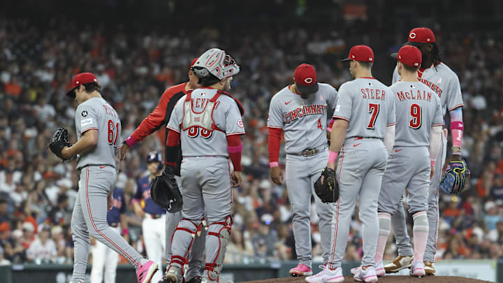 May 11, 2025; Houston, Texas, USA; Cincinnati Reds starting pitcher Chase Petty (61) walks off the mound after a pitching change in the fourth inning against the Houston Astros at Daikin Park. Mandatory Credit: Troy Taormina-Imagn Images May 11, 2025; Houston, Texas, USA; Cincinnati Reds starting pitcher Chase Petty (61) walks off the mound after a pitching change in the fourth inning against the Houston Astros at Daikin Park. Mandatory Credit: Troy Taormina-Imagn Images