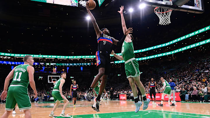 Dec 12, 2024; Boston, Massachusetts, USA; Detroit Pistons forward Paul Reed (7) shoots over Boston Celtics center Luke Kornet (40) during the first half at TD Garden. Mandatory Credit: Eric Canha-Imagn Images Dec 12, 2024; Boston, Massachusetts, USA; Detroit Pistons forward Paul Reed (7) shoots over Boston Celtics center Luke Kornet (40) during the first half at TD Garden. Mandatory Credit: Eric Canha-Imagn Images