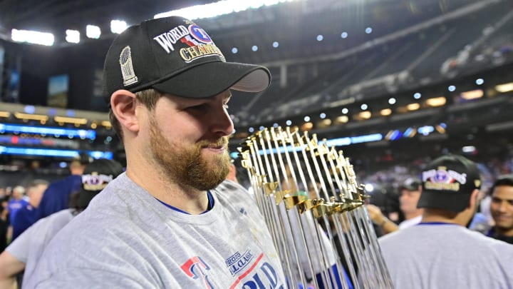 Nov 1, 2023; Phoenix, AZ, USA; Texas Rangers starting pitcher Jordan Montgomery (52) celebrates